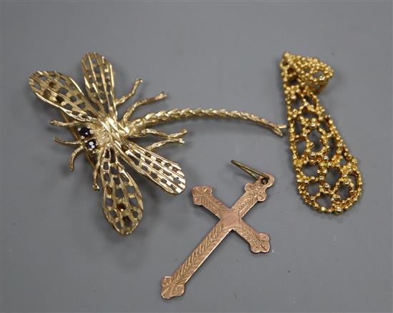 A yellow metal damsel fly brooch with sapphire eyes, a 9ct gold openwork pendant and a 9ct gold cross.